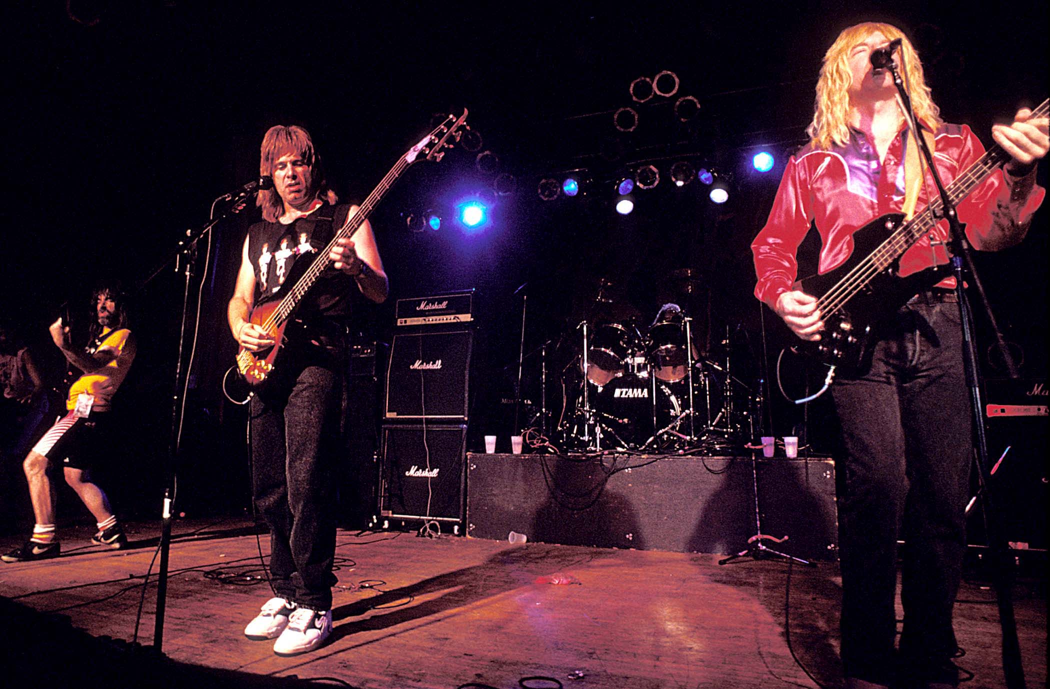 Spinal Tap perform onstage in 1991