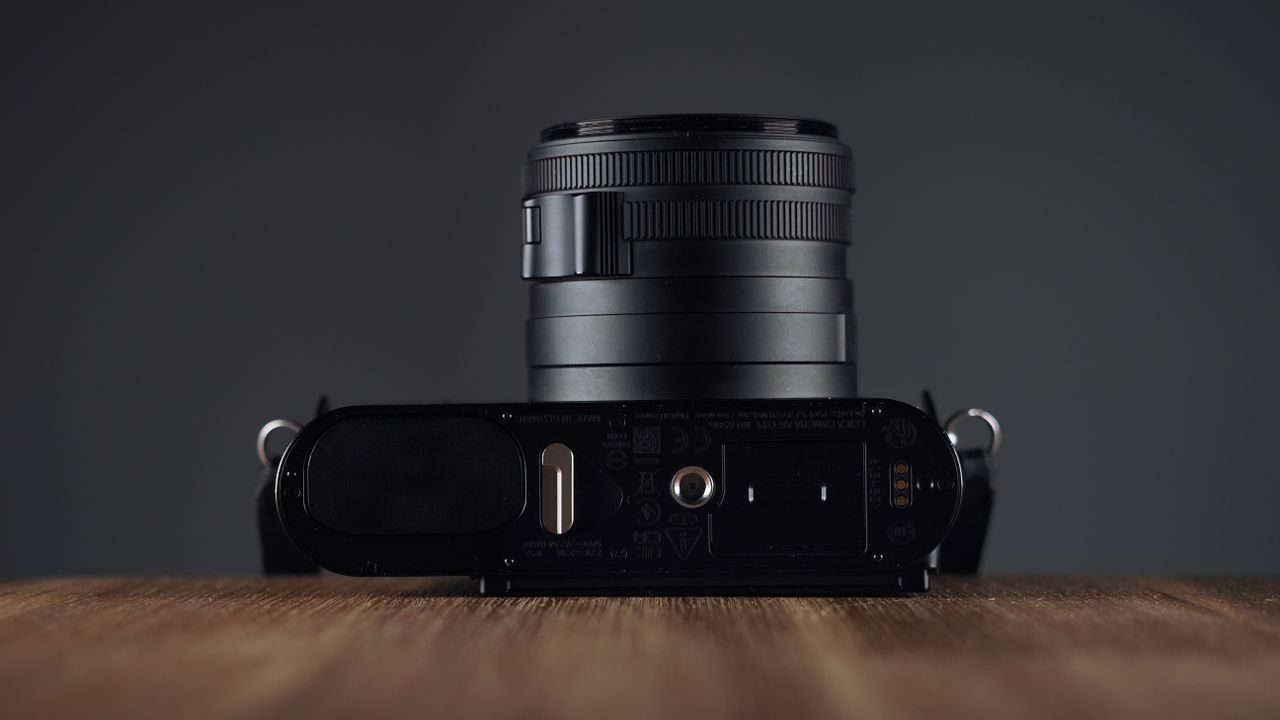 Leica Q3 Monochrom on a wooden surface