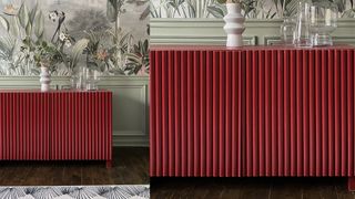 striking red textured sideboard in front of green wainscotting and patterned wallpaper