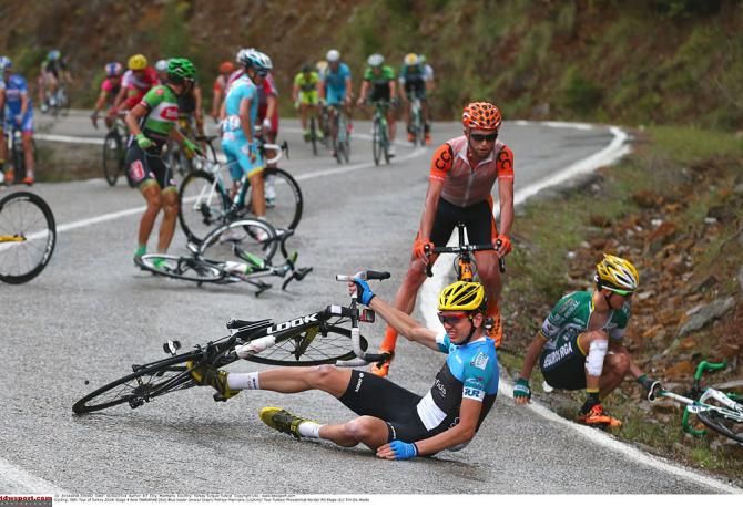 Race leader Rein Taaramae goes down