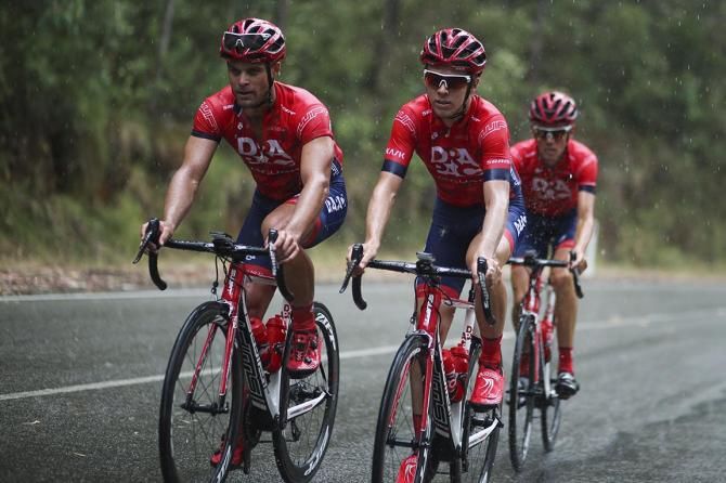 Malcolm Rudolph, Sam Spokes and Tim Roe ride on through the rain