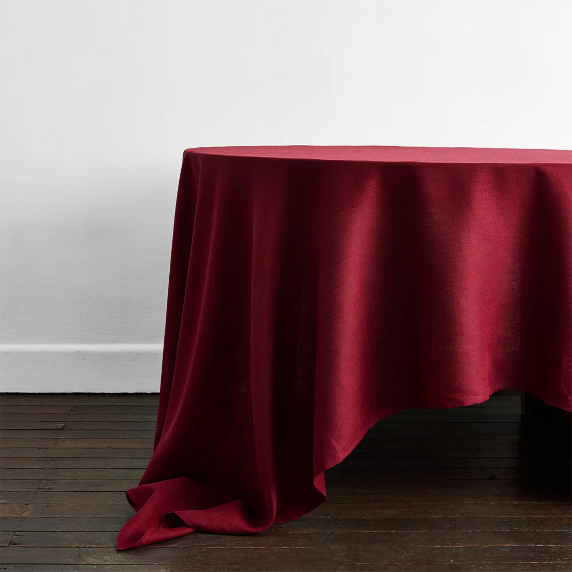 Red draped linen tablecloth