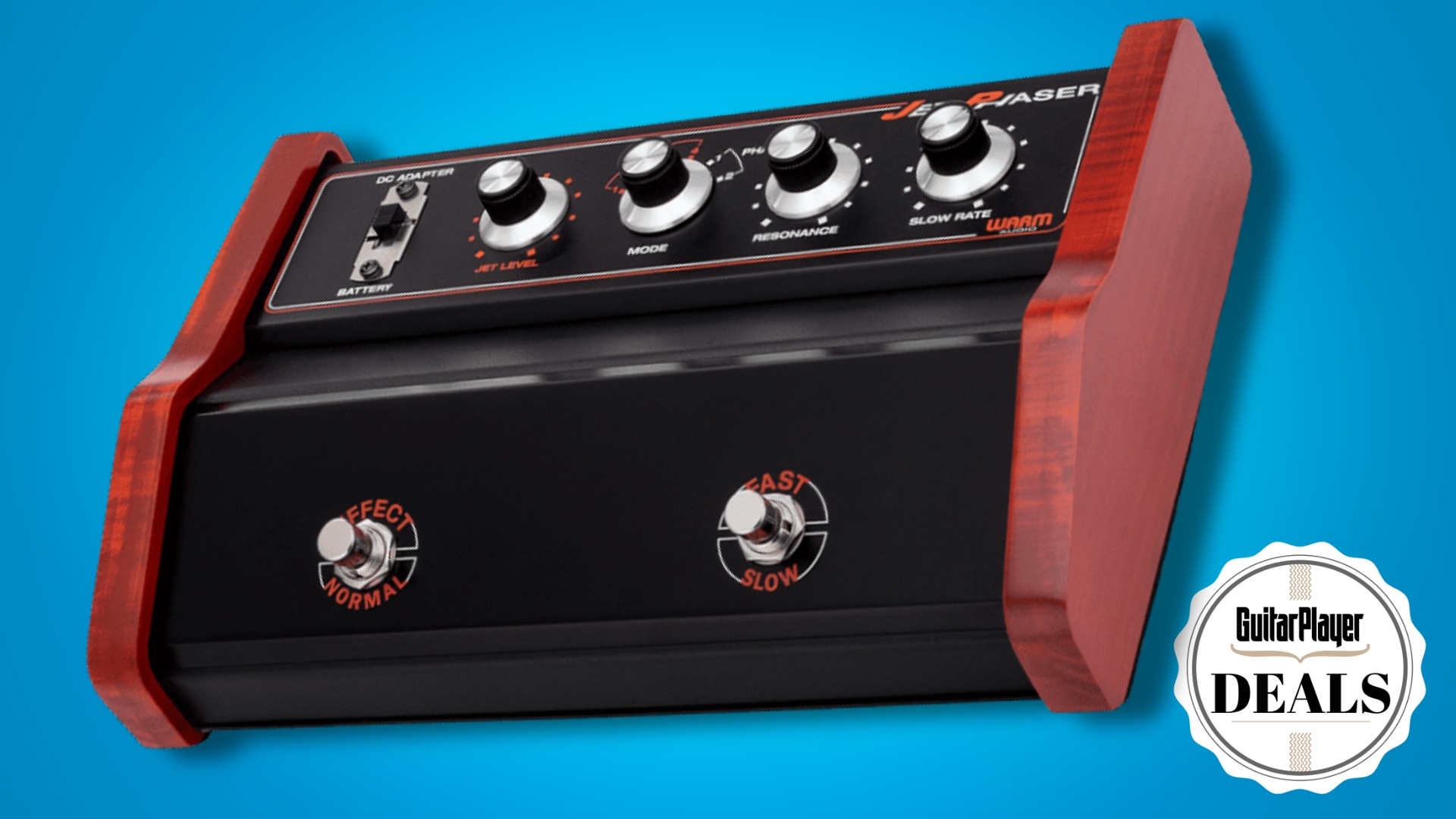A Warm Audio Jet Phaser guitar pedal on a blue background