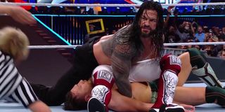 Roman Reigns pinning Edge and Daniel Bryan