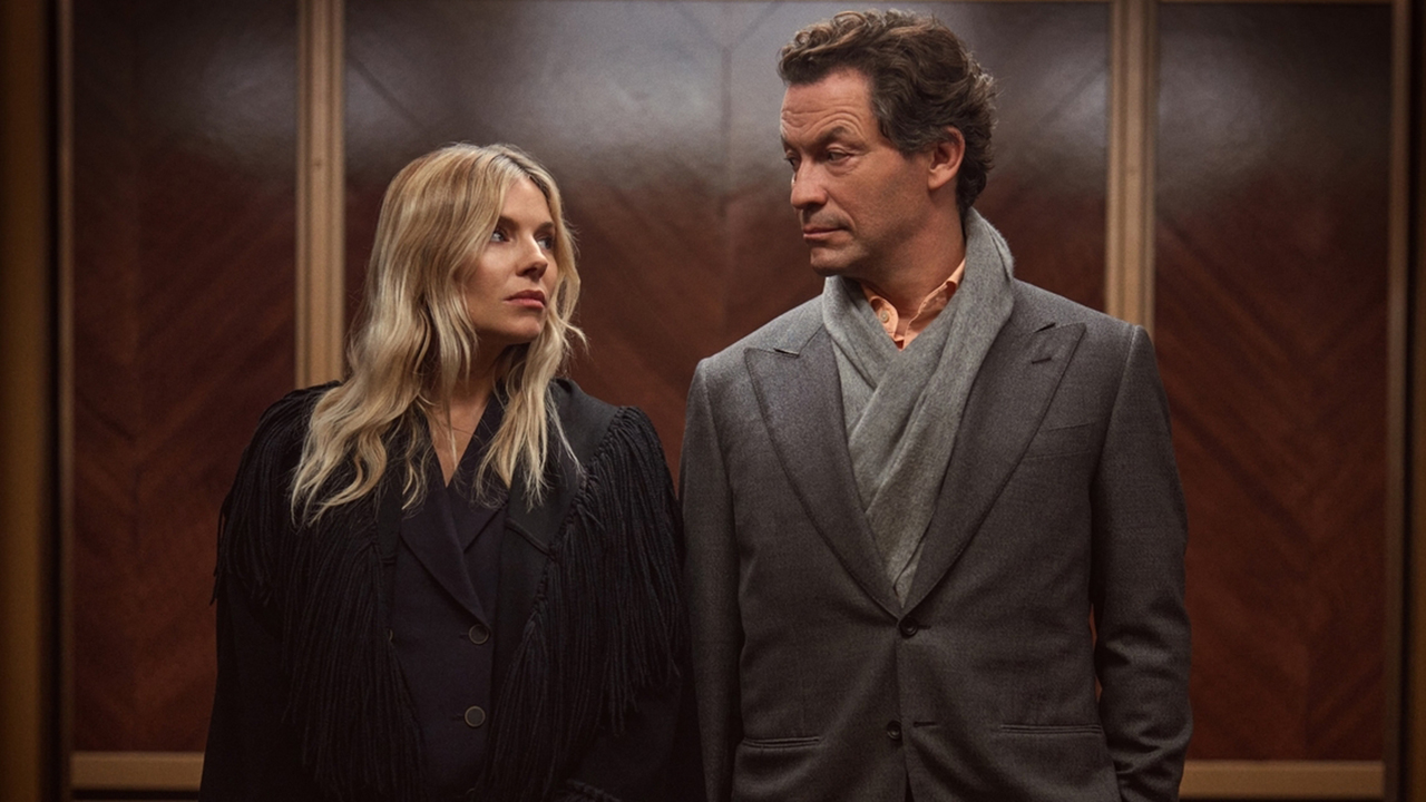 Sienna Miller's Carla and Dominic West's Morgan looking at each other in HBO and Sky legal drama WAR