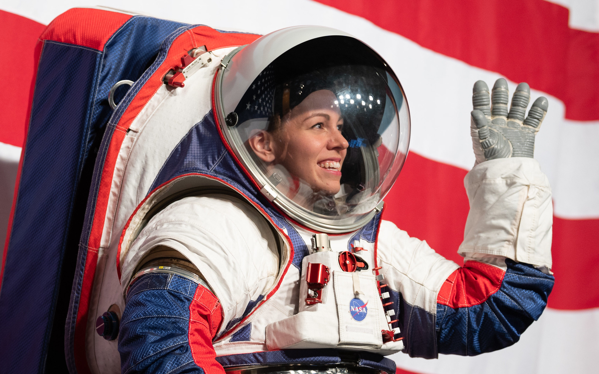 Kristine Davis, a spacesuit engineer at NASA’s Johnson Space Center, wearing a ground prototype of NASA’s new Exploration Extravehicular Mobility Unit (xEMU), is seen during a demonstration of the suit, Tuesday, Oct. 15, 2019 at NASA Headquarters in Washington.