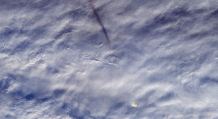 A GIF showing the tail and fireball of a meteor that exploded over the Bering Sea on Dec. 18, 2018. No one saw the explosion coming, but NASA's Terra satellite captured this view looking down through the clouds.
