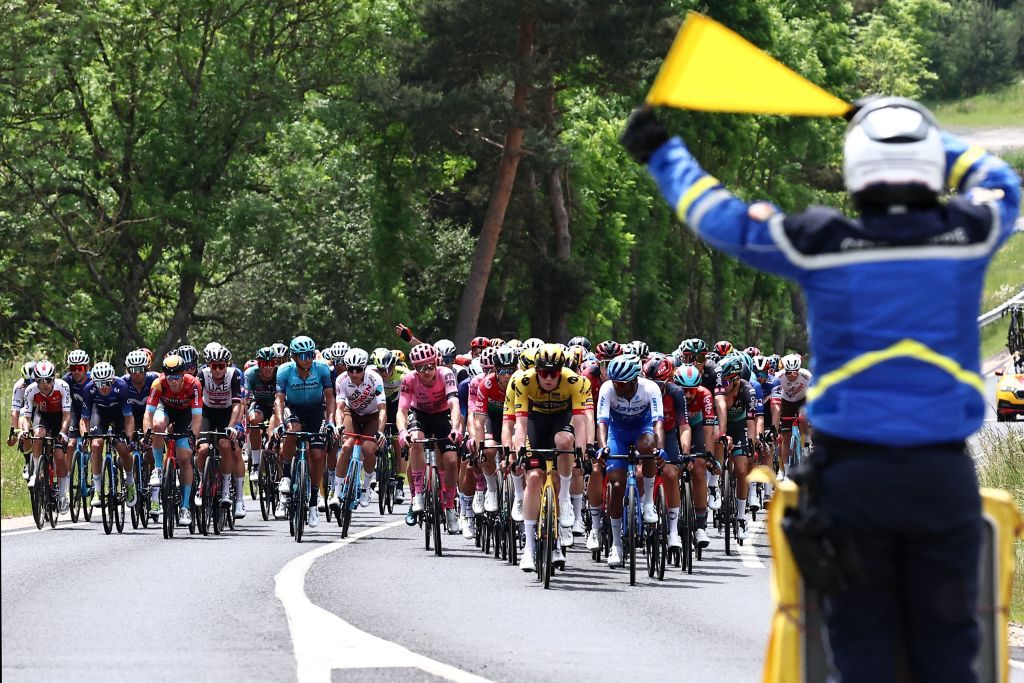 The pack rides during the third stage of the 75th edition of the Criterium du Dauphine cycling race 1945 kms between MonistrolSurLoire and Le Coteau centraleastern France on June 6 2023 Photo by AnneChristine POUJOULAT AFP Photo by ANNECHRISTINE POUJOULATAFP via Getty Images