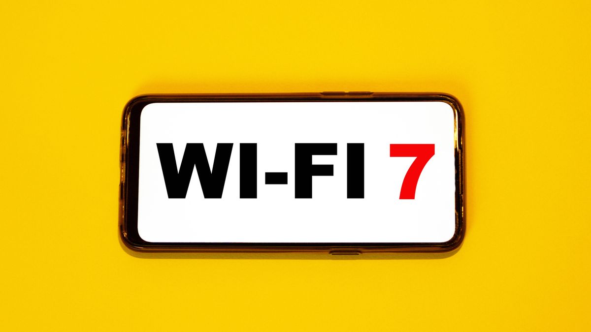 Wi-fi 7 seen on a smartphone against a yellow background