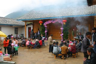 Unidentified Mosuo Minority People attend a wedding ceremony and wedding feast, September 19, 2013, in Linlang, Yunnan, China.