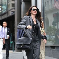 An image of Andy Sachs outfits from The Devil Wears Prada 2.