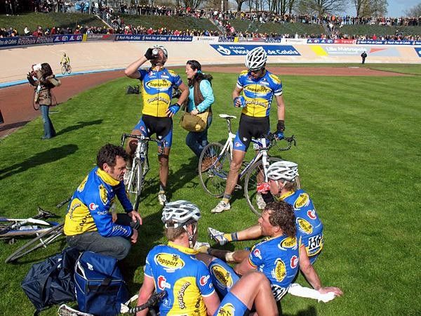 The Topsport Vlaanderen riders gather on the track of Roubaix. They looked like boy scouts. "Next time we are going to win. Win, win win!"