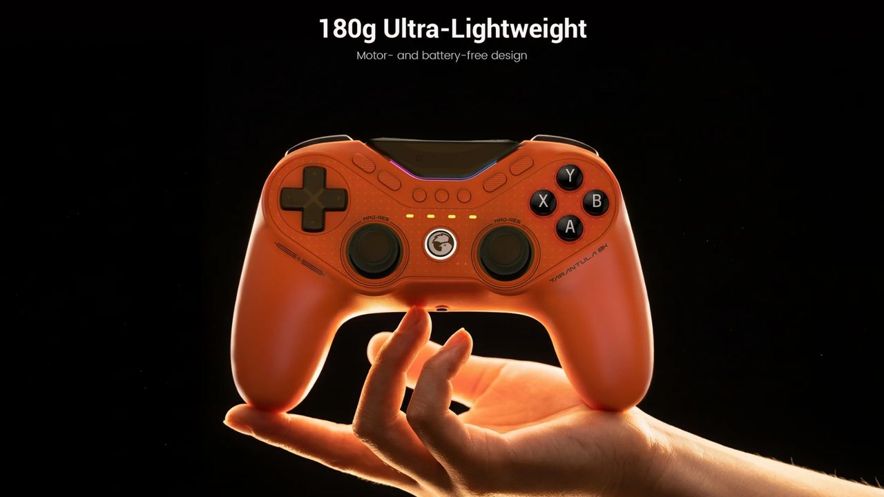 The orange Tarantula Pro controller for PC, showing its lightweight design