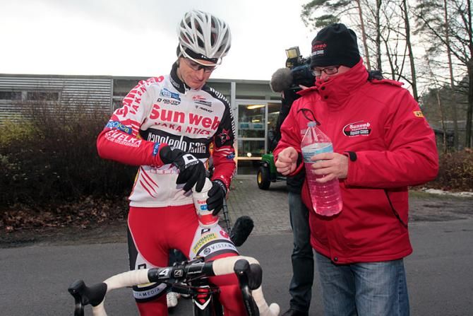 Belgian championship contender Kevin Pauwels stays hydrated for his course pre-ride.