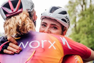 Demi Vollering (SD Worx) being congratulated by her third-placed teammate Marken Reusser after her Liège-Bastogne-Liège Femmes win