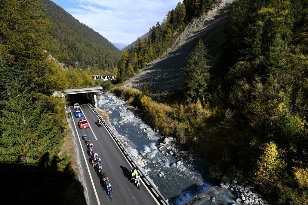LAGHI DI CANCANO ITALY OCTOBER 22 Fabio Felline of Italy and Astana Pro Team Ben Oconnor of Australia and NTT Pro Cycling Team Joseph Lloyd Dombrowski of The United States and UAE Team Emirates Ruben Guerreiro of Portugal and Team EF Pro Cycling Blue Mountain Jersey Daniel Navarro Garcia of Spain and Team Israel StartUp Nation Ben Swift of The United Kingdom and Team INEOS Grenadiers Antonio Pedrero Lopez of Spain and Movistar Team Sergio Samitier Samitier of Spain and Movistar Team Filippo Ganna of Italy and Team INEOS Grenadiers Passo dello Stelvio Stilfserjoch 2758m Mountains Landscape Forest Peloton Breakaway during the 103rd Giro dItalia 2020 Stage 18 a 207km stage from Pinzolo to Laghi di Cancano Parco Nazionale dello Stelvio 1945m girodiitalia Giro on October 22 2020 in Laghi di Cancano Italy Photo by Tim de WaeleGetty Images
