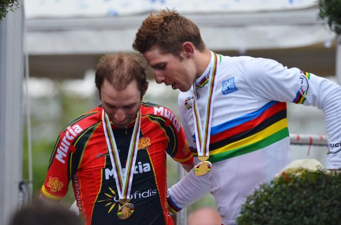 Alejandro Valverde (Spain) and teammate Rui Costa (Portugal) share a word after the podium celebration