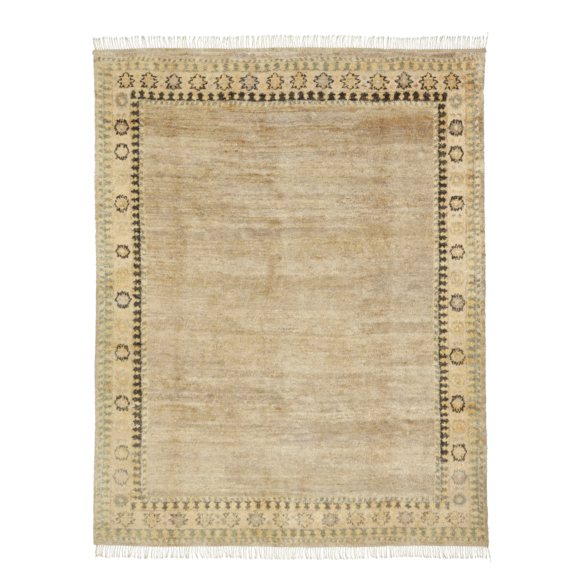 a tan rug with a black border and abstract floral motifs along the sides