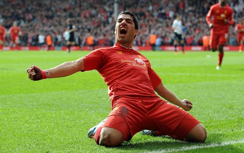 Liverpool&#039;s Luis Suarez celebrates scoring against Tottenham Hotspur