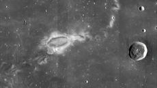A mosaic of Lunar Reconnaissance Orbiter Camera (LROC) images showing the lunar swirl Reiner Gamma. The &ldquo;eye&rdquo; of the swirl can be seen in the center left, while other bright markings of the swirl extend to the lower left and upper right of the image. 