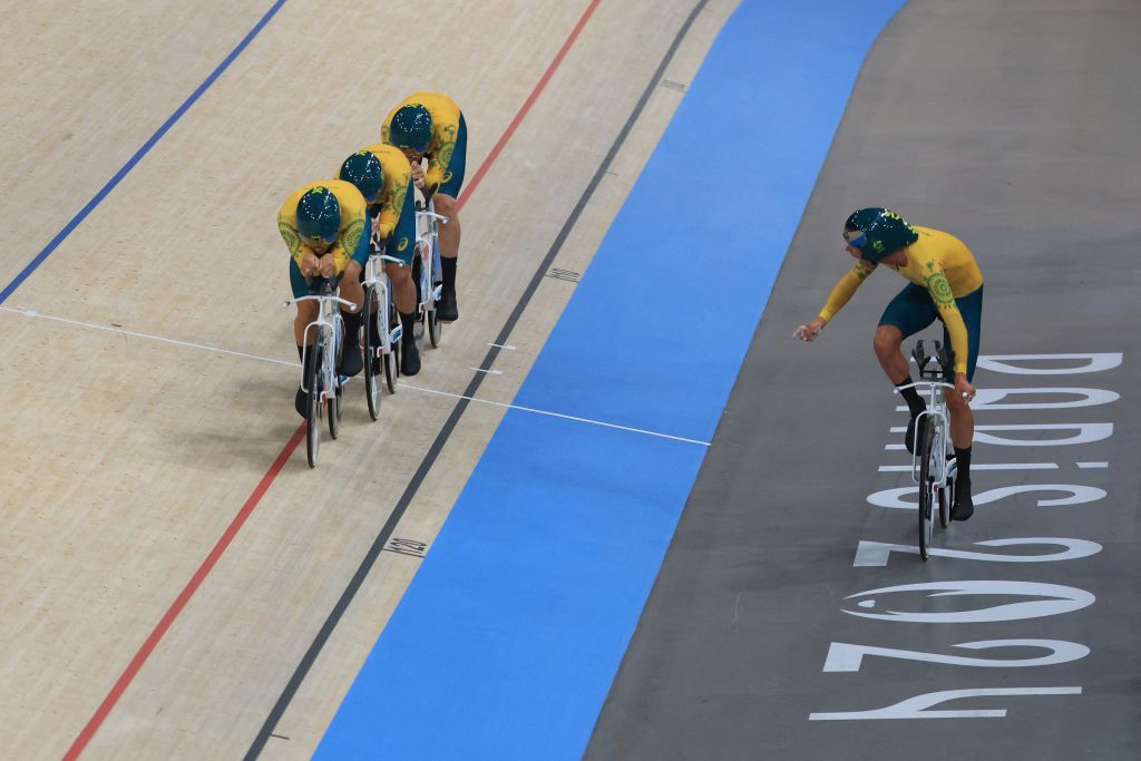Australia's Oliver Bleddyn, Australia's Sam Welsford, Australia's Conor Leahy and Australia's Kelland O'brien compete in a men's track cycling team pursuit first round of the Paris 2024 Olympic Games at the Saint-Quentin-en-Yvelines National Velodrome in Montigny-le-Bretonneux, south-west of Paris, on August 6, 2024. (Photo by Emmanuel DUNAND / AFP)