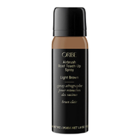 Oribe Airbrush Root Touch-Up Spray | RRP: $34 / £30
Available in three shades (light brown, black and blonde), this touch-up spray immediately cover grays and disguises roots with microfine pigments that blend in seamlessly. 