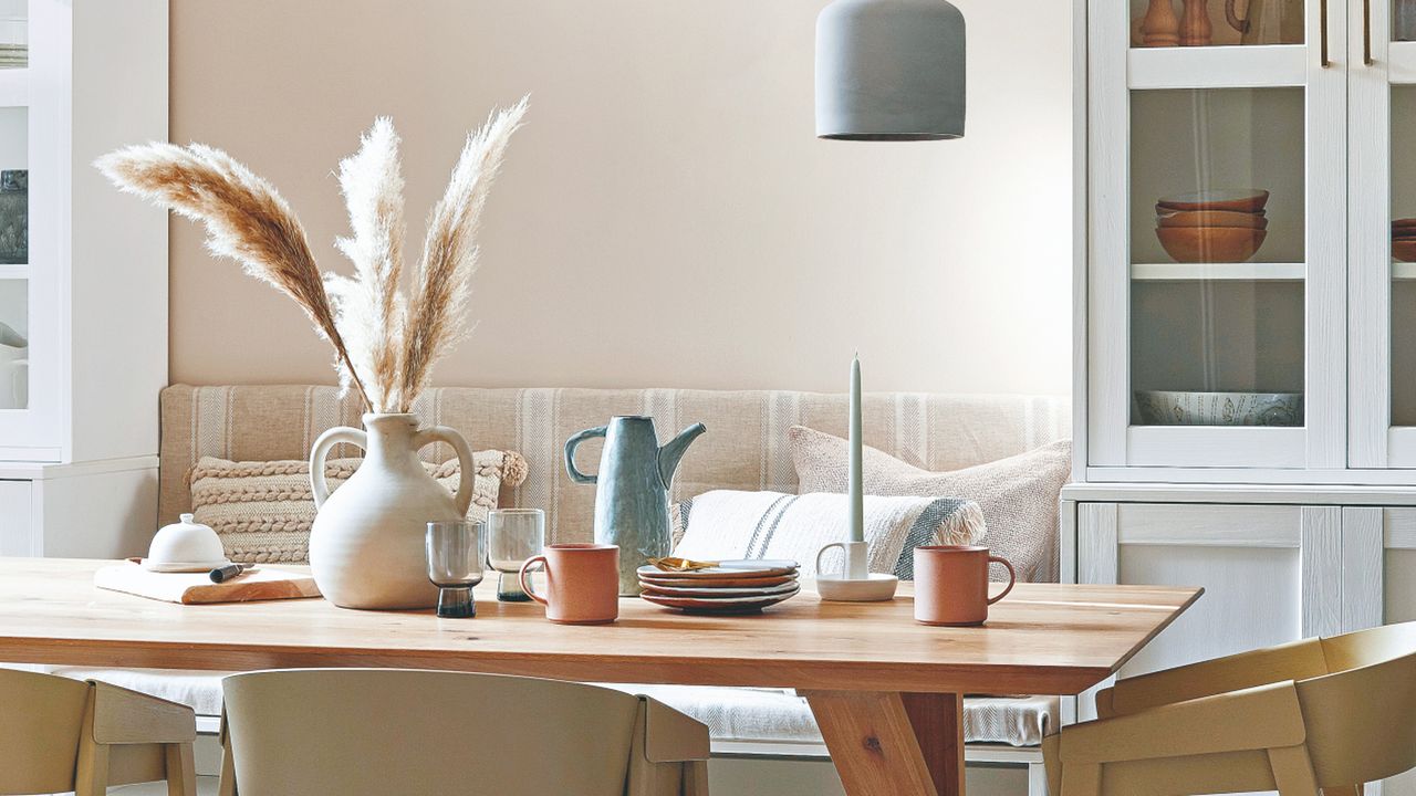 Dining table and built-in kitchen bench with drawers in dining area