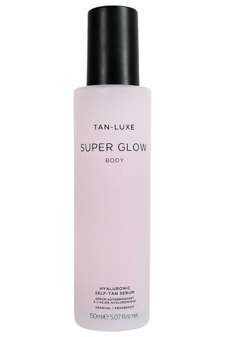 A bottle of TAN-LUXE self tanning serum against a white background.