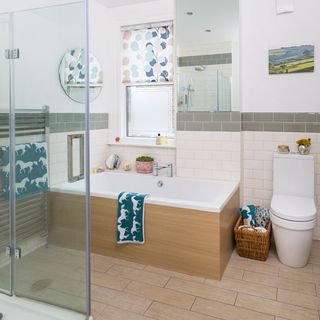 bathroom with wooden flooring and storage basket