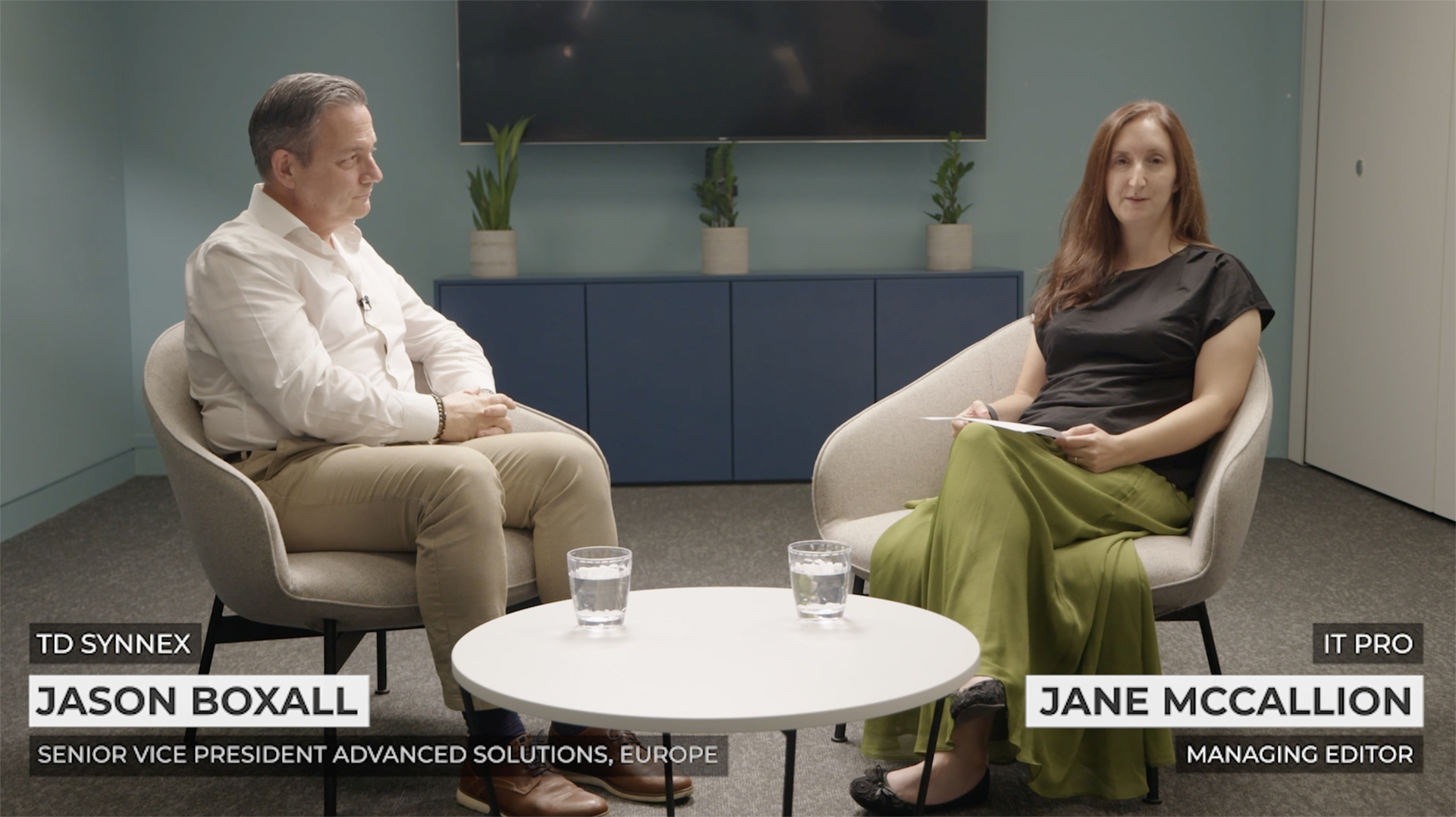 Jane McCallion and Jason Boxall sitting in chairs