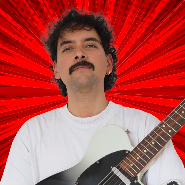 Guitar World writer Matt McCracken holding a Telecaster guitar