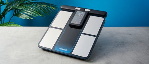 a body fat smart scale by renpho with a pull out handle to measure limb fat percentage and silver electrodes and a blue and black casing rests on a surface in front of a blue background