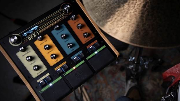 Walrus Audio DFX-1 Percussion Processing Unit next to a cymbal