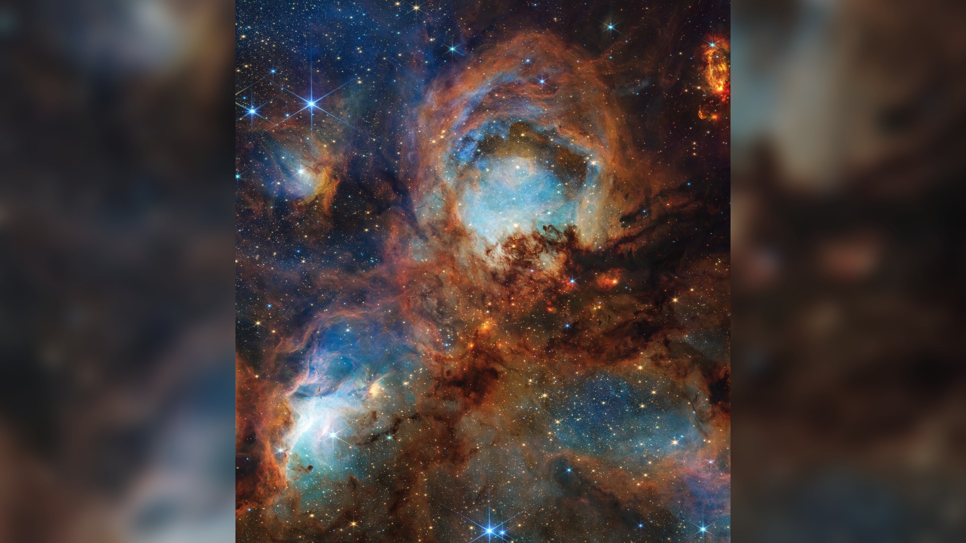 a round colorful wisp of gas in space on a starry background