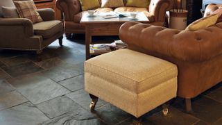 riven slate flooring in traditional living room