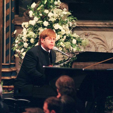 Elton John playing the piano at Princess Diana's funeral
