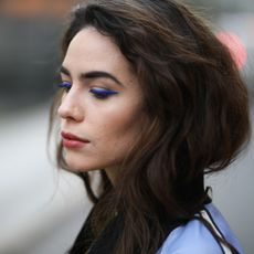 Frankie Miles wearing Raincoat jacket sportmax and colored eyeliner on March 20, 2019 in Berlin, Germany. 