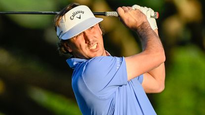 Kelly Kraft hits an iron shot at the Sony Open