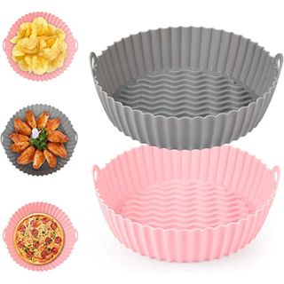 A set of two silicone air fryer liners in gray and pastel pink