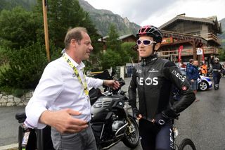 Tour de France race director Christian Prudhomme talks to Geraint Thomas