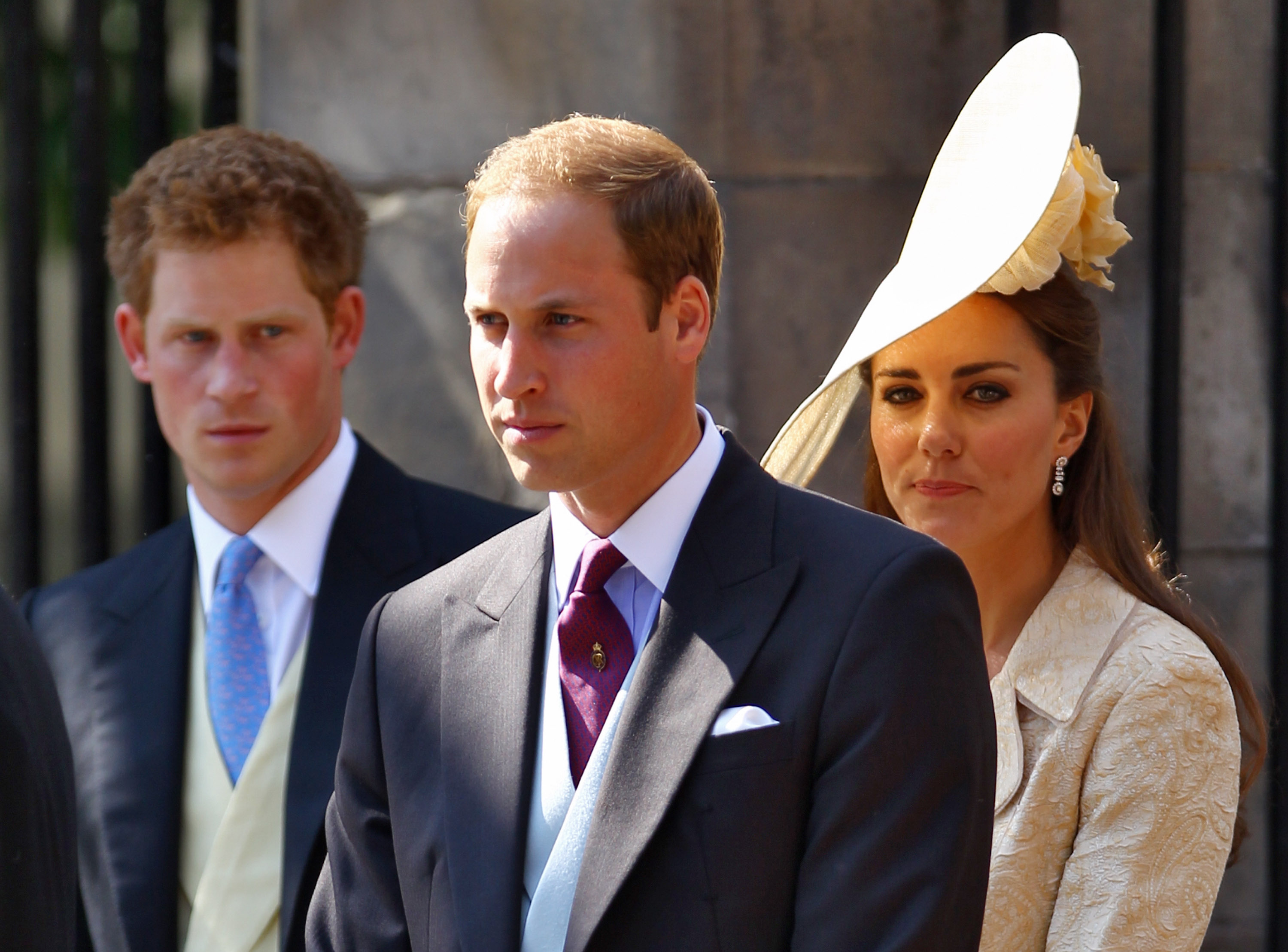 Prince Harry, Prince William, Duke of Cambridge and Catherine, Duchess of Cambridge depart after the Royal wedding of Zara Phillips and Mike Tindall at Canongate Kirk on July 30, 2011 in Edinburgh, Scotland