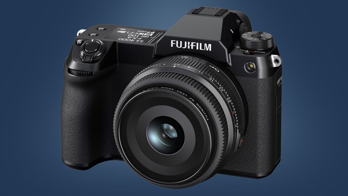 The Fujifilm GFX50S II camera on a bluebackground