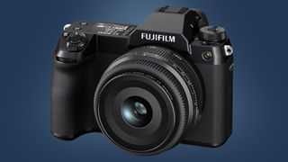 The Fujifilm GFX50S II camera on a bluebackground
