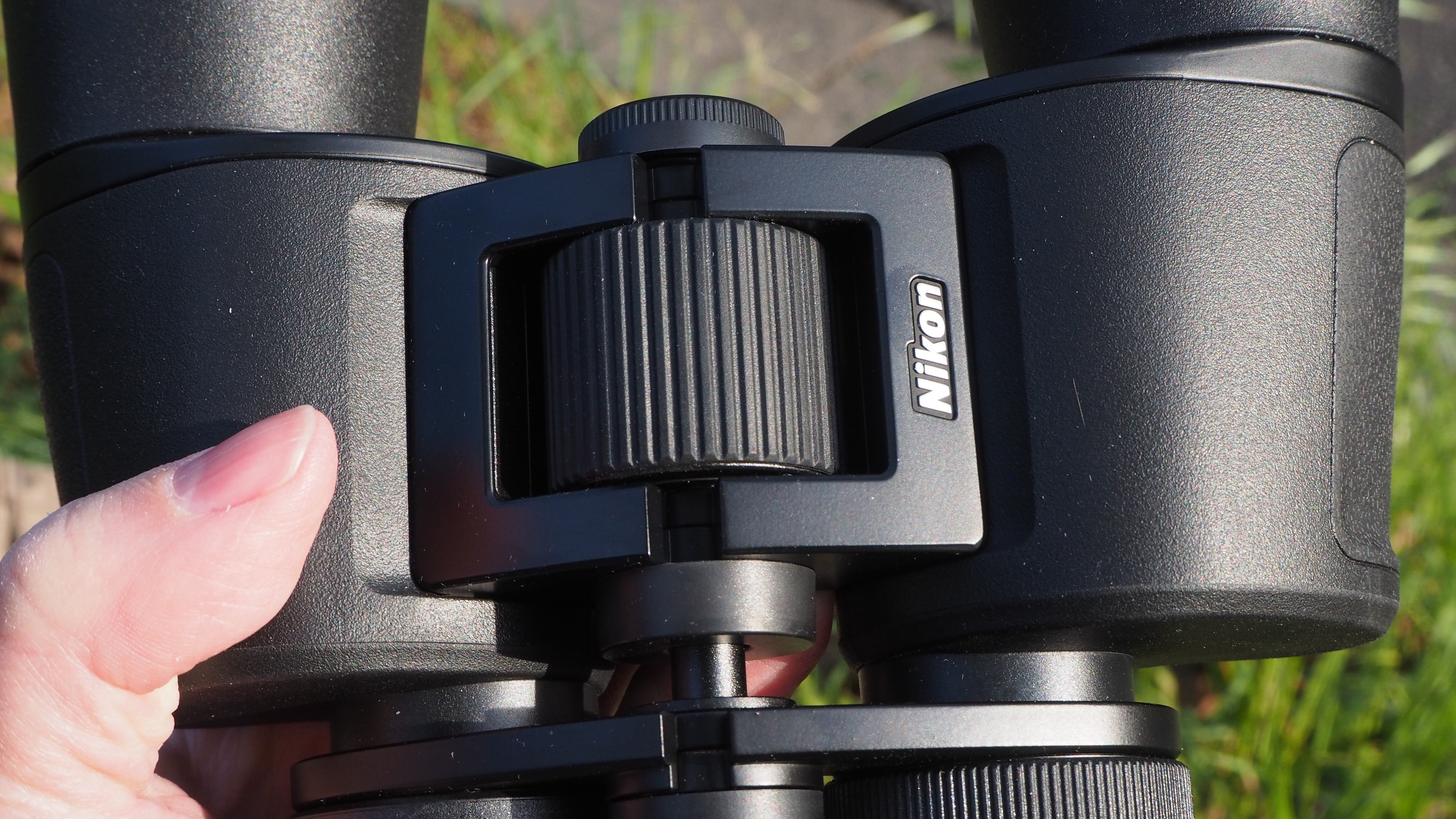 Nikon Action 10x42 binoculars in someone's hand