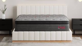 Best cooling mattress: image shows the Zoma Boost mattress placed on a white leather bedframe