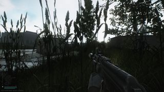 An escapee wading through a swamp in first person