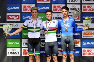 INNSBRUCK, AUSTRIA - SEPTEMBER 25: Podium / Lucas Plapp of Australia Silver Medal / Remco Evenepoel of Belgium Gold Medal / Andrea Piccolo of Italy Bronze Medal / Celebration / during the Men Juniors Individual Time Trial a 27,8km race from Wattens to Innsbruck 582m at the 91st UCI Road World Championships 2018 / ITT / RWC /on September 25, 2018 in Innsbruck, Austria. (Photo by Justin Setterfield/Getty Images)