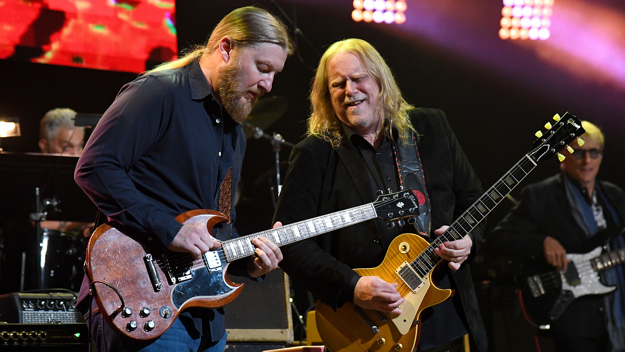 Derek Trucks and Warren Haynes perform onstage during the Fourth Annual LOVE ROCKS NYC Benefit Concert For God's Love We Deliver at Beacon Theatre on March 12, 2020 in New York City.