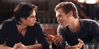 The Vampire Diaries Damon Salvatore and Klaus Mikaelson talking at the bar