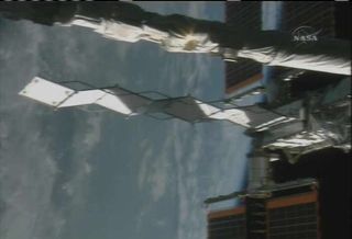 Mission Atlantis: Spacewalkers Help Deploy New ISS Radiator